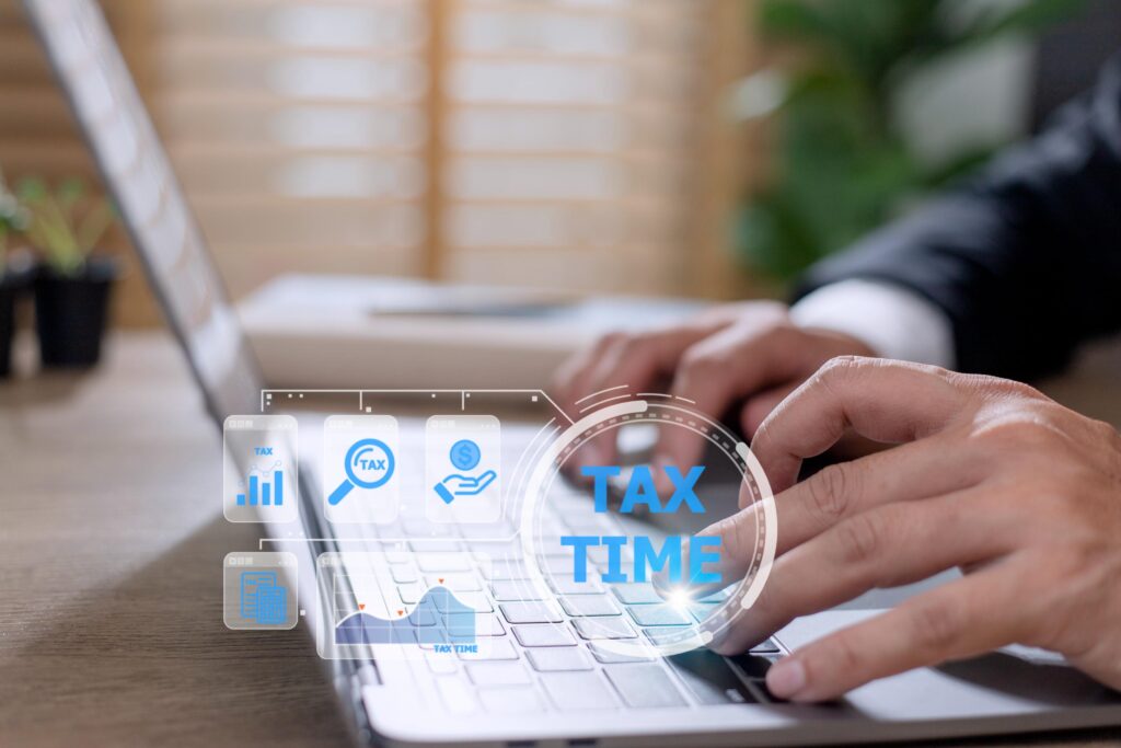 UAE corporate tax and VAT experts reviewing financial documents for business compliance