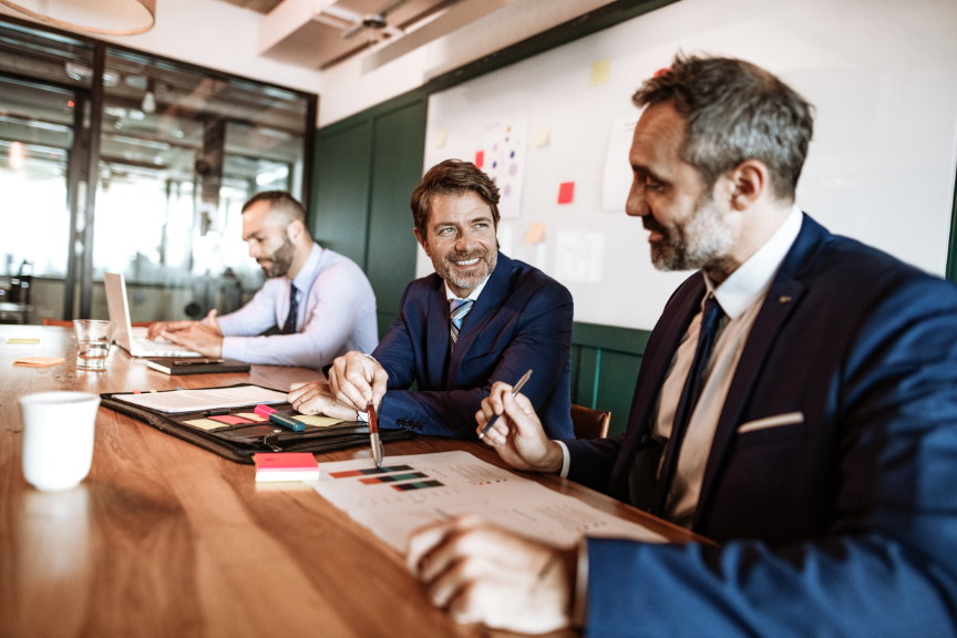 M&A advisory services UAE team reviewing merger and acquisition deal strategy