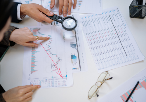 Financial professionals reviewing loan structuring and debt advisory services in Dubai
